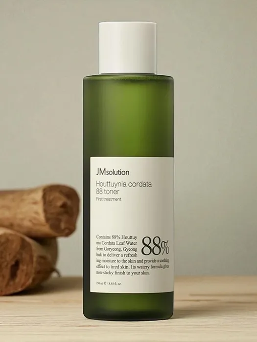 Korean skincare toner by JMsolution, featuring heartleaf formula in green bottle with white lid