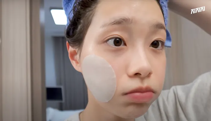 Chuu’s skincare step with toner pad on cheek after washing