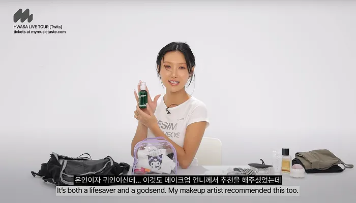 Hwasa revealing her favorite skincare product during a skincare interview