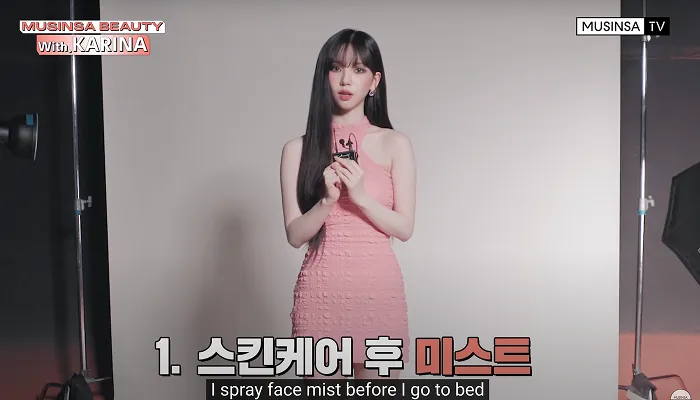 Karina explaining her routine of spritzing face mist after moisturizing in an interview