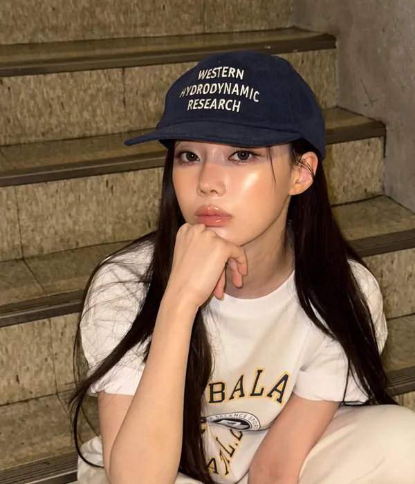 Korean cheek makeup trend featuring a sunburn blush look with highlighter swept across the cheekbones for a radiant finish