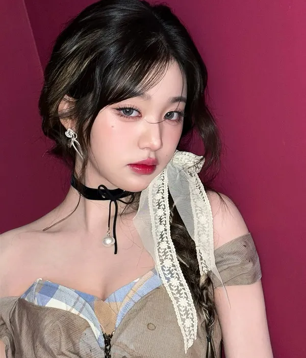 Close-up of Korean lip makeup trend using a lip plumper to create fuller, bigger lips with a glossy finish