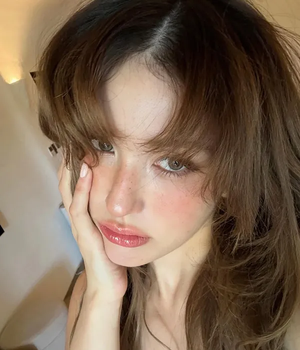 Close-up of semi-smokey eye makeup, showcasing a soft Korean beauty trend with blended shadows and natural definition