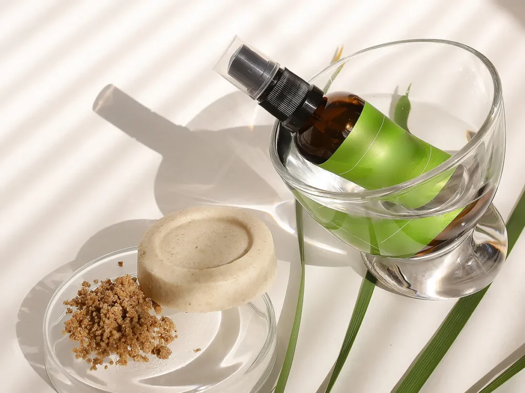 High angle view of vegan skincare soap and essential oil