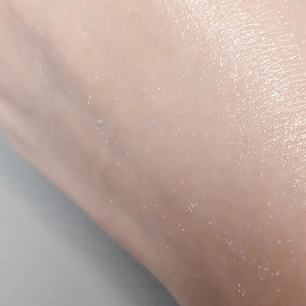Leftover granules remain after massaging into the skin