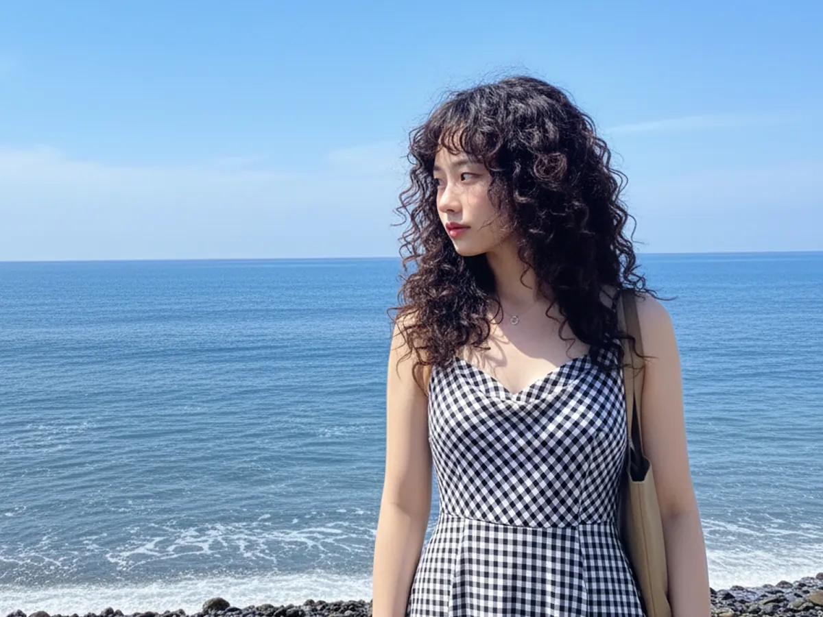 Female with a Korean hippie perm