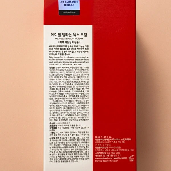 Close-up of the back of the Medipeel package showing the Korean ingredient list and usage instructions