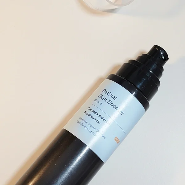 The Meditherapy Retinal Serum placed on a table with cap removed